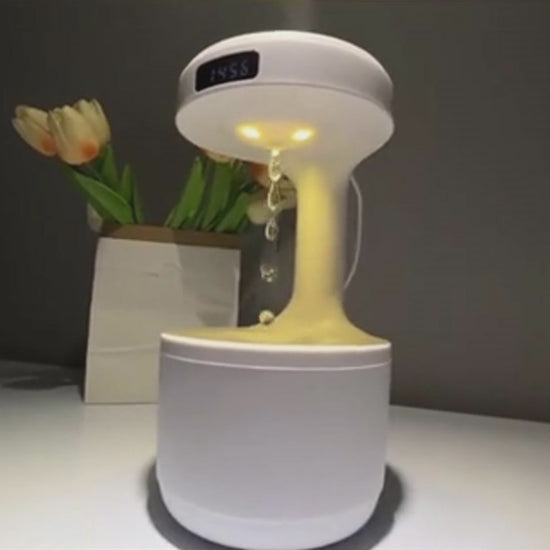 Antigravitations Luftfuktare 500ml med LED-belysning och svävande vattendroppar, perfekt som dekorativ aromadiffusor för hemmet.